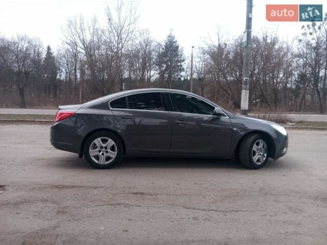 Серый Опель Инсигния, объемом двигателя 2 л и пробегом 285 тыс. км за 8350 $, фото 4 на Automoto.ua