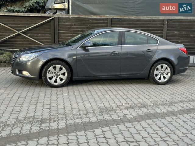 Серый Опель Инсигния, объемом двигателя 2 л и пробегом 114 тыс. км за 9700 $, фото 4 на Automoto.ua