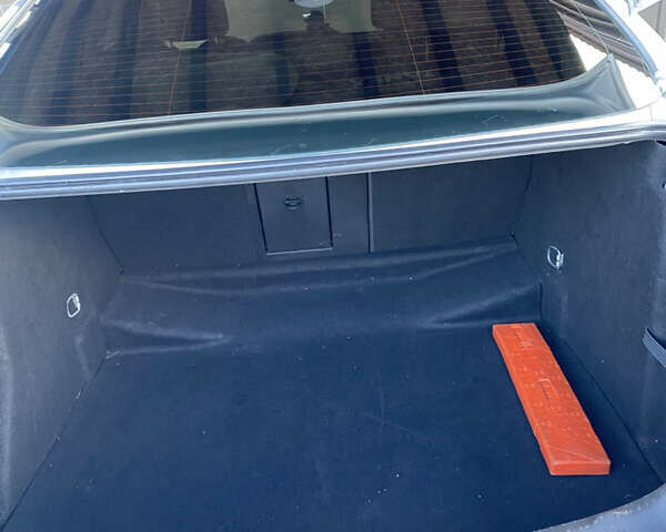 Сірий Опель Інсігнія, об'ємом двигуна 1.96 л та пробігом 205 тис. км за 11200 $, фото 5 на Automoto.ua