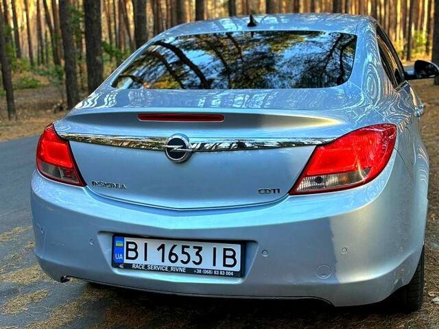 Серый Опель Инсигния, объемом двигателя 2 л и пробегом 270 тыс. км за 8500 $, фото 1 на Automoto.ua