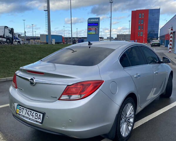 Сірий Опель Інсігнія, об'ємом двигуна 1.96 л та пробігом 205 тис. км за 11200 $, фото 2 на Automoto.ua