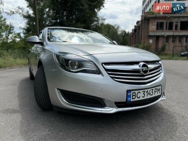 Серый Опель Инсигния, объемом двигателя 2 л и пробегом 241 тыс. км за 8300 $, фото 4 на Automoto.ua
