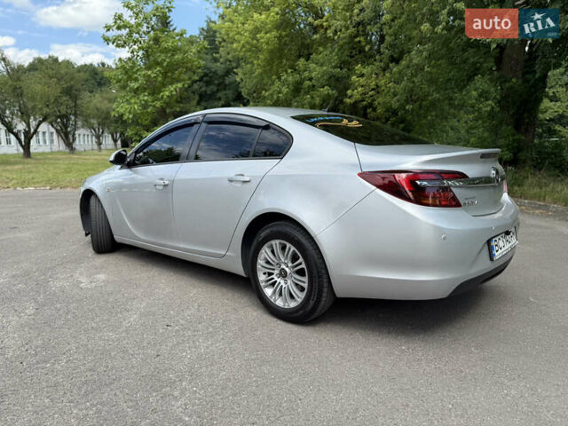 Серый Опель Инсигния, объемом двигателя 2 л и пробегом 241 тыс. км за 8300 $, фото 6 на Automoto.ua