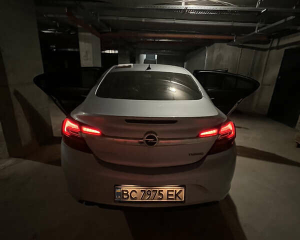 Сірий Опель Інсігнія, об'ємом двигуна 2 л та пробігом 99 тис. км за 11000 $, фото 2 на Automoto.ua