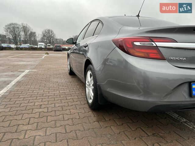 Серый Опель Инсигния, объемом двигателя 1.6 л и пробегом 155 тыс. км за 10300 $, фото 5 на Automoto.ua