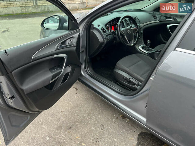Серый Опель Инсигния, объемом двигателя 1.6 л и пробегом 155 тыс. км за 10100 $, фото 4 на Automoto.ua