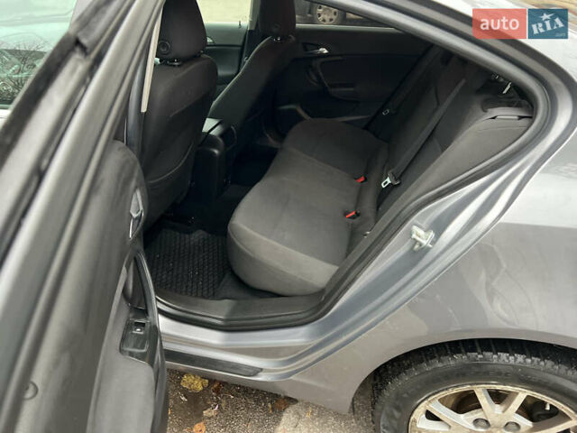 Серый Опель Инсигния, объемом двигателя 1.6 л и пробегом 155 тыс. км за 10100 $, фото 7 на Automoto.ua