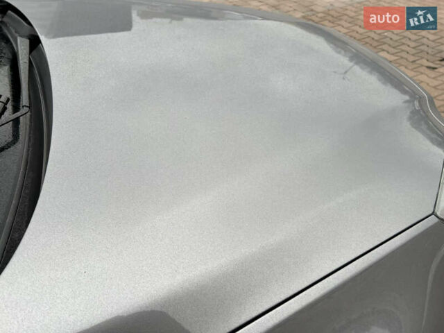 Серый Опель Инсигния, объемом двигателя 1.6 л и пробегом 155 тыс. км за 10300 $, фото 25 на Automoto.ua