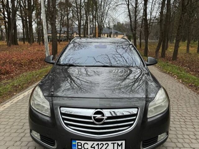 Серый Опель Инсигния, объемом двигателя 2 л и пробегом 210 тыс. км за 159 $, фото 1 на Automoto.ua