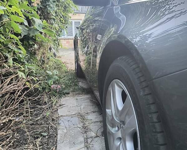 Сірий Опель Інсігнія, об'ємом двигуна 1.96 л та пробігом 240 тис. км за 6500 $, фото 10 на Automoto.ua