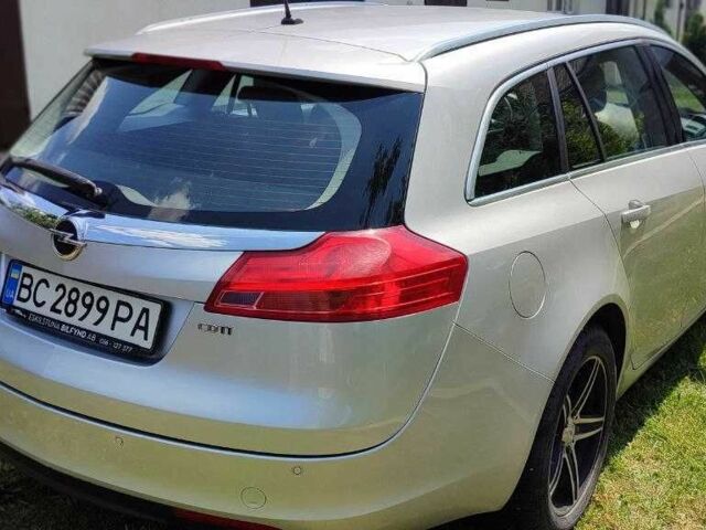 Серый Опель Инсигния, объемом двигателя 2 л и пробегом 243 тыс. км за 7300 $, фото 5 на Automoto.ua