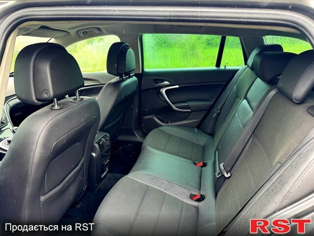 Серый Опель Инсигния, объемом двигателя 2 л и пробегом 220 тыс. км за 7500 $, фото 6 на Automoto.ua