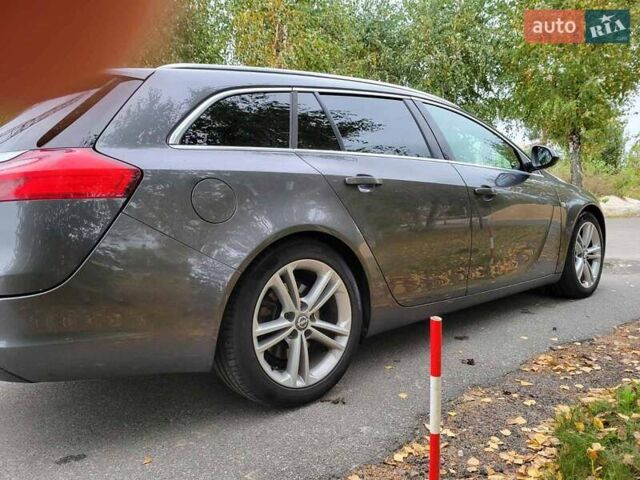 Серый Опель Инсигния, объемом двигателя 2 л и пробегом 185 тыс. км за 7200 $, фото 5 на Automoto.ua
