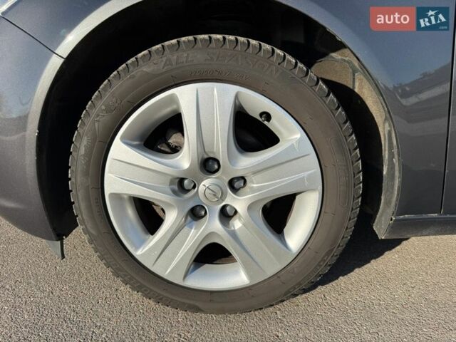 Серый Опель Инсигния, объемом двигателя 1.8 л и пробегом 197 тыс. км за 7900 $, фото 61 на Automoto.ua