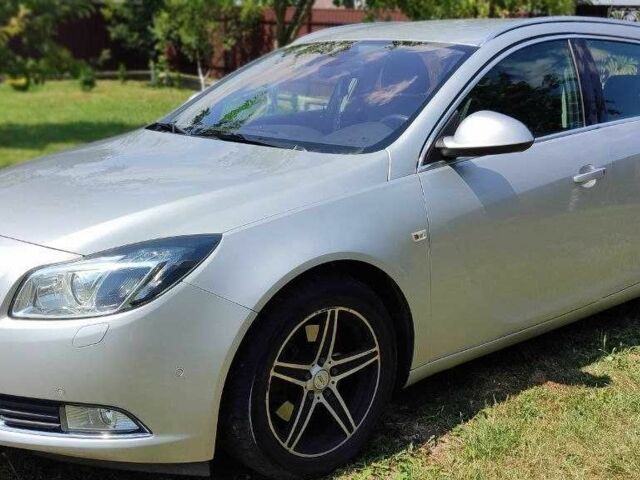 Серый Опель Инсигния, объемом двигателя 2 л и пробегом 243 тыс. км за 7900 $, фото 3 на Automoto.ua