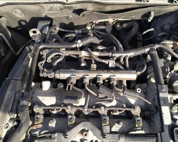 Сірий Опель Інсігнія, об'ємом двигуна 1.96 л та пробігом 240 тис. км за 6500 $, фото 2 на Automoto.ua