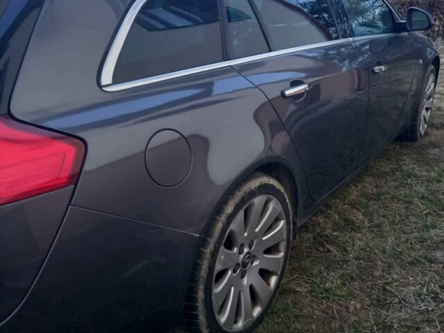 Серый Опель Инсигния, объемом двигателя 2 л и пробегом 300 тыс. км за 8500 $, фото 3 на Automoto.ua