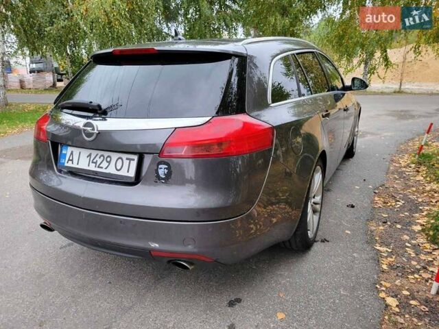 Серый Опель Инсигния, объемом двигателя 2 л и пробегом 185 тыс. км за 7200 $, фото 4 на Automoto.ua