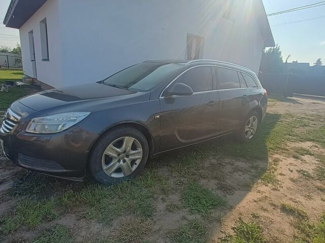 Серый Опель Инсигния, объемом двигателя 2 л и пробегом 238 тыс. км за 6500 $, фото 3 на Automoto.ua