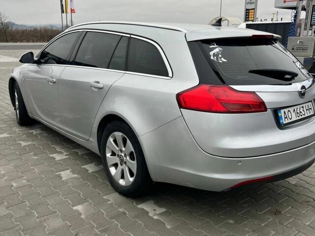 Серый Опель Инсигния, объемом двигателя 2 л и пробегом 220 тыс. км за 5999 $, фото 4 на Automoto.ua