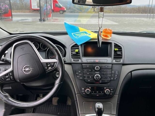 Серый Опель Инсигния, объемом двигателя 2 л и пробегом 220 тыс. км за 5999 $, фото 2 на Automoto.ua