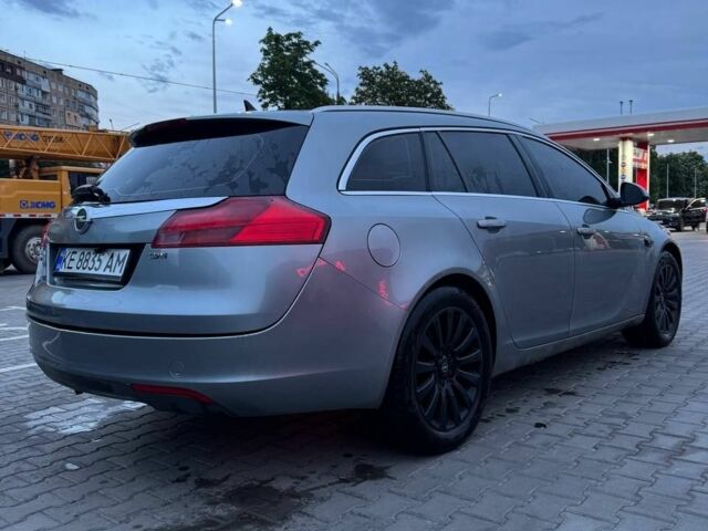 Сірий Опель Інсігнія, об'ємом двигуна 2 л та пробігом 230 тис. км за 7999 $, фото 3 на Automoto.ua