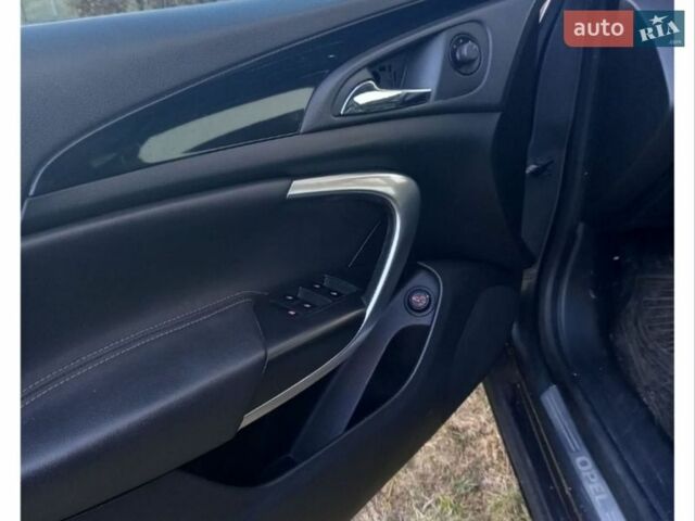 Сірий Опель Інсігнія, об'ємом двигуна 2 л та пробігом 300 тис. км за 8500 $, фото 1 на Automoto.ua