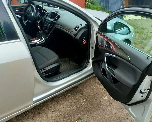 Серый Опель Инсигния, объемом двигателя 2 л и пробегом 350 тыс. км за 7100 $, фото 5 на Automoto.ua