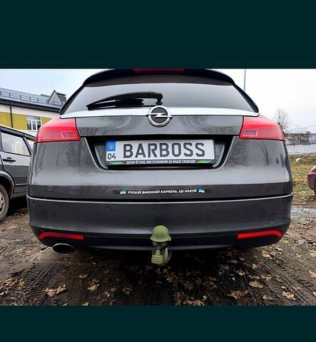 Серый Опель Инсигния, объемом двигателя 2 л и пробегом 416 тыс. км за 7750 $, фото 5 на Automoto.ua