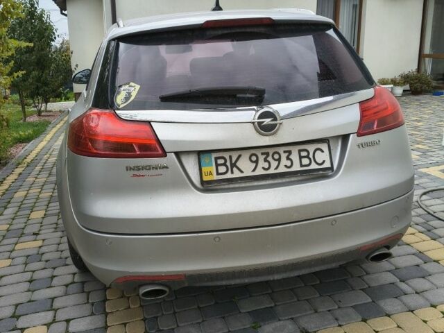 Серый Опель Инсигния, объемом двигателя 1.6 л и пробегом 185 тыс. км за 4500 $, фото 2 на Automoto.ua