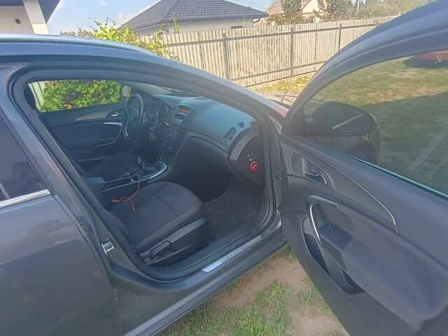 Серый Опель Инсигния, объемом двигателя 2 л и пробегом 238 тыс. км за 6500 $, фото 4 на Automoto.ua