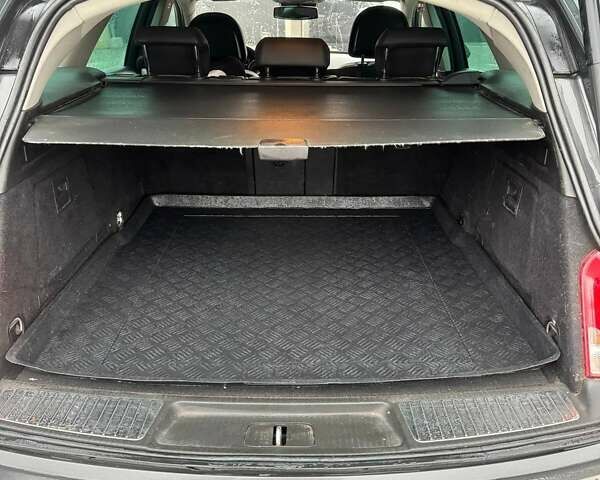 Серый Опель Инсигния, объемом двигателя 2 л и пробегом 210 тыс. км за 6690 $, фото 2 на Automoto.ua