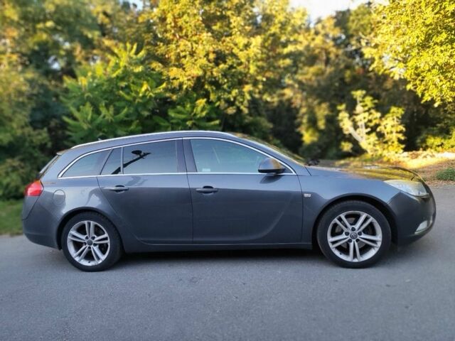 Серый Опель Инсигния, объемом двигателя 2 л и пробегом 339 тыс. км за 3900 $, фото 3 на Automoto.ua