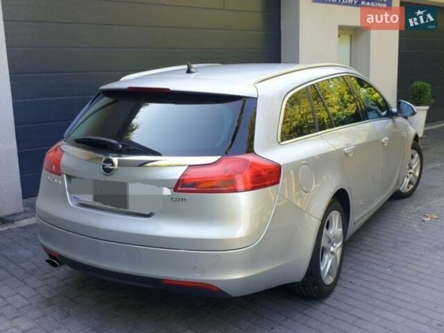 Серый Опель Инсигния, объемом двигателя 1.96 л и пробегом 300 тыс. км за 6300 $, фото 2 на Automoto.ua