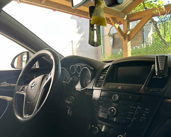 Серый Опель Инсигния, объемом двигателя 2 л и пробегом 346 тыс. км за 6850 $, фото 6 на Automoto.ua