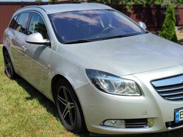 Серый Опель Инсигния, объемом двигателя 2 л и пробегом 243 тыс. км за 7300 $, фото 2 на Automoto.ua