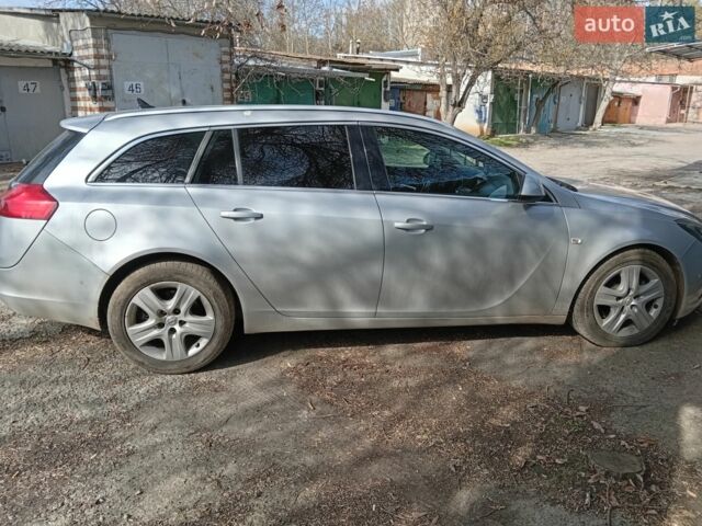 Серый Опель Инсигния, объемом двигателя 1.96 л и пробегом 182 тыс. км за 7300 $, фото 6 на Automoto.ua