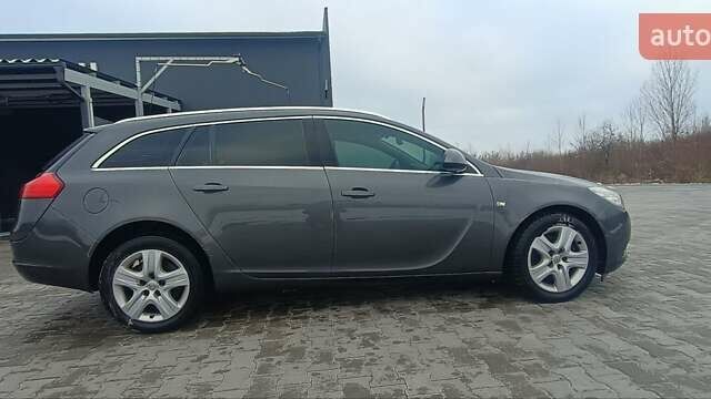 Серый Опель Инсигния, объемом двигателя 1.96 л и пробегом 250 тыс. км за 6500 $, фото 2 на Automoto.ua