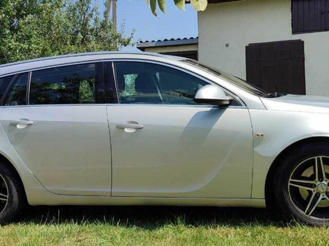 Серый Опель Инсигния, объемом двигателя 2 л и пробегом 243 тыс. км за 7300 $, фото 4 на Automoto.ua