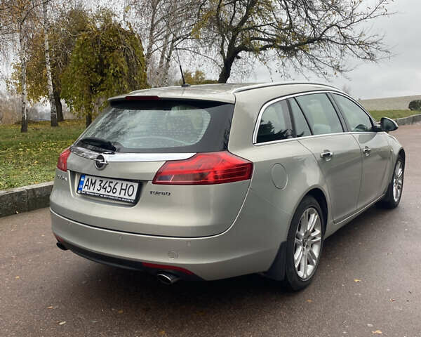 Серый Опель Инсигния, объемом двигателя 2 л и пробегом 299 тыс. км за 7500 $, фото 5 на Automoto.ua