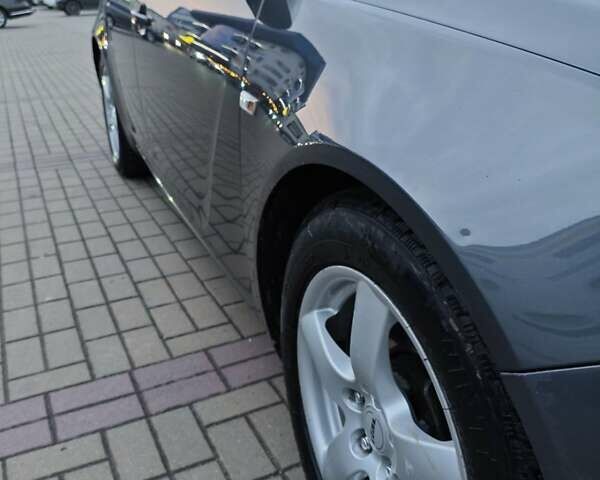 Серый Опель Инсигния, объемом двигателя 1.96 л и пробегом 298 тыс. км за 5800 $, фото 6 на Automoto.ua