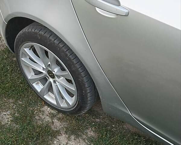 Серый Опель Инсигния, объемом двигателя 2 л и пробегом 245 тыс. км за 6700 $, фото 1 на Automoto.ua