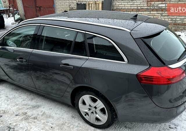 Серый Опель Инсигния, объемом двигателя 1.8 л и пробегом 200 тыс. км за 7650 $, фото 4 на Automoto.ua