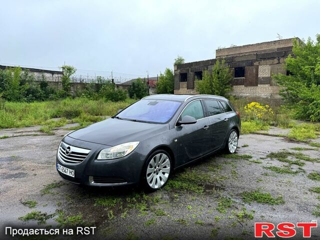 Серый Опель Инсигния, объемом двигателя 2 л и пробегом 220 тыс. км за 7500 $, фото 1 на Automoto.ua