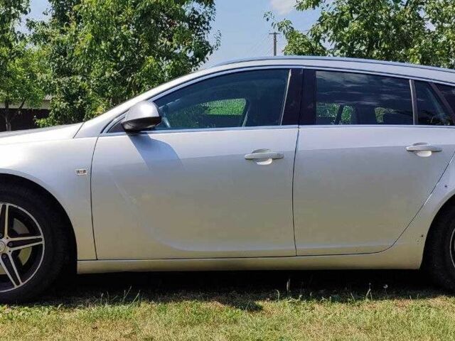 Сірий Опель Інсігнія, об'ємом двигуна 2 л та пробігом 243 тис. км за 7300 $, фото 1 на Automoto.ua