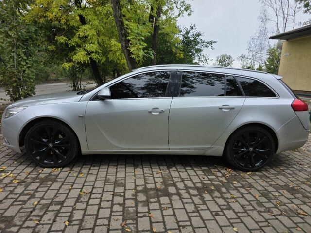 Серый Опель Инсигния, объемом двигателя 2 л и пробегом 239 тыс. км за 5900 $, фото 1 на Automoto.ua