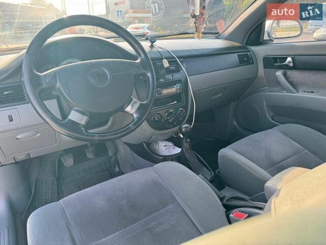 Сірий Опель Інсігнія, об'ємом двигуна 1.96 л та пробігом 290 тис. км за 6350 $, фото 15 на Automoto.ua
