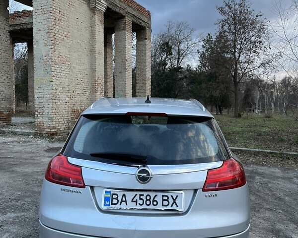 Серый Опель Инсигния, объемом двигателя 1.96 л и пробегом 240 тыс. км за 6900 $, фото 1 на Automoto.ua