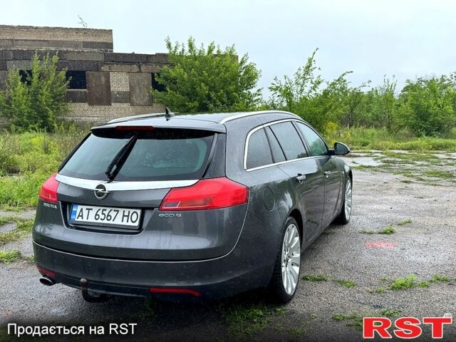 Серый Опель Инсигния, объемом двигателя 2 л и пробегом 220 тыс. км за 7500 $, фото 4 на Automoto.ua