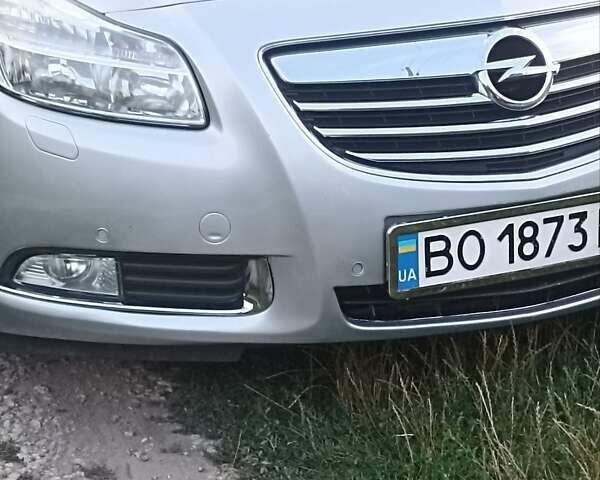 Серый Опель Инсигния, объемом двигателя 2 л и пробегом 245 тыс. км за 6700 $, фото 5 на Automoto.ua